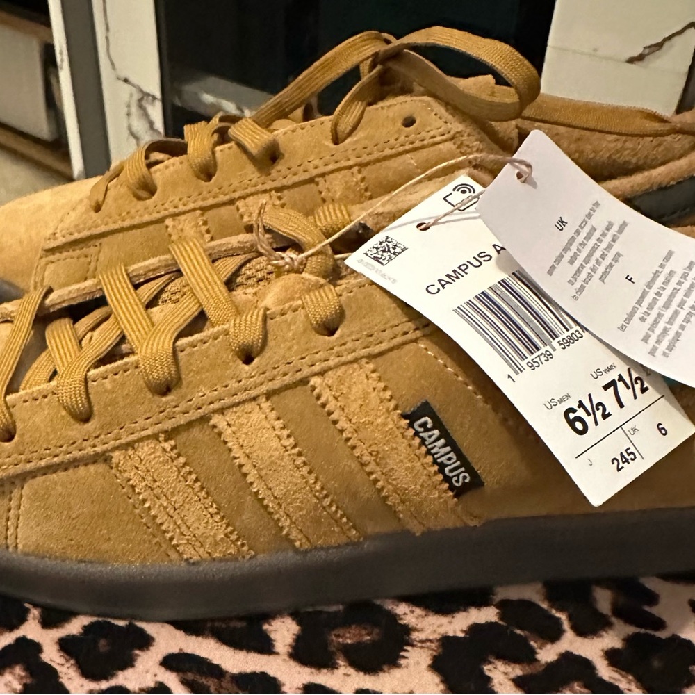 Never worn tan adidas with suede like material.
